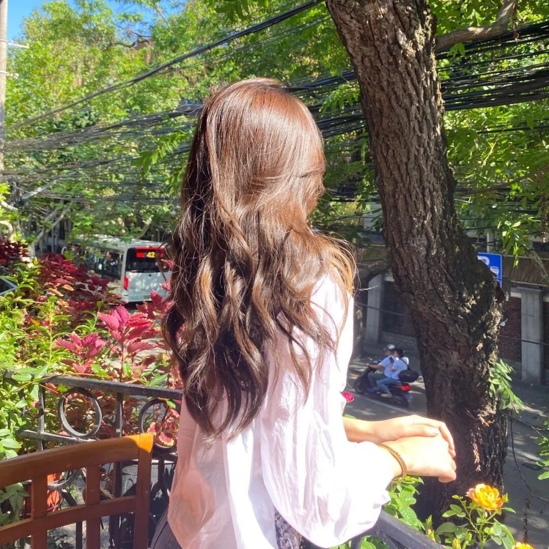 听见她说